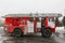 Fire truck with ladders and hoses - big red Russian fire fighting vehicle