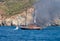 Fire on Turkish yacht in the Mediterranean Sea. The yacht is all on fire. Close-up. Oludeniz,Fethiye,Mugla,Turkey