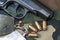 Firearm Pistol And Hand Gun Ammunition on military camouflage background