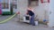 Firefighter demonstrates safe extinguishing a fire in the kitchen