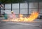 Firefighter fighting fire during training