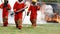 Firefighter fighting with flame using fire hose chemical water foam spray engine. Fireman wear hard hat, body safe suit uniform fo