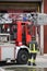 Firefighter and fire truck during a firefighting exercise