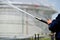 Firefighter holding high pressure water hose