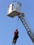 Firefighter hung the rope climbing during the practical exercise