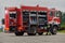 A firefighter meticulously prepares a modern firetruck for a mission to evacuate and respond to dangerous situations