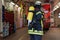 Firefighter with oxygen cylinder in the fire department