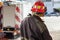 Firefighter Spraying Water At Fire Station