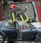 Firefighter team takes off the car roof to pull the wound