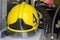 Firefighter uniform with red helmet. Close-up image of a red helmet of a fireman.