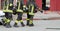 firefighters carried the injured away on stretchers