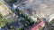 Firefighters extinguish a fire on the roof of a residential highrise building. top view