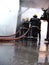 Firefighters fighting industrial fire, firefighting team