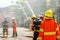 Firefighters group of Lampang city confederate water spray and control the hoses