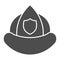 Firefighters helmet solid icon. Fireman protection hat with a shield emblem glyph style pictogram on white background