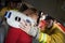 Firefighters helping an injured woman in a car