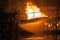 Firefighters hosing down a burning structure during firefighting exercise