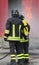 Firefighters with oxygen bottles off the fire during a training