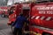 Firefighters on standby and trying to extinguish the fire at the furniture warehouse fire site. : Yogyakarta, Indonesia - 12 May