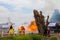 Firefighters train near the stump.