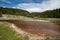 Firehole Lake in Yellowstone National Park, along Firehole Canyon Drive, a geothermal hot spring area