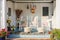 Fireman and patriotic themed worn wooden front porch in Cape Cod with three white rocking chairs and pillows and wicker foot