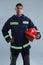 Fireman standing with hand on hip