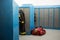 Firemen`s locker room, uniforms and bags next to the lockers. Firefighter uniforms on Lisbon, Portugal