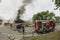 Firemen trying to extinguish a garage fire