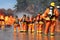 Firemen wearing fire fighter suit for safety and using water, extinguisher to fighting with fire flame in an emergency situation