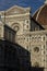 Firenze`s white marble cathedral facade detail, famous landmark in Tuscany