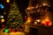 Fireplace and decorated Christmas tree and candles