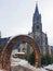 A firewood arch with church of Saints Philip and James