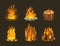 Firewood boards, night outdoor bonfire of branches, fire burning wooden logs, flaming, extinct fire bonfire, coals. Wood campfire