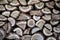 Firewood close-up. Background of chopped firewood in a pile.