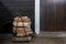 Firewood next to the open door to the traditional Finnish sauna