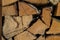 Firewood seasoned hardwood split logs cut background texture