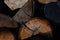 Firewood stockpile close up with vivid colours and textures