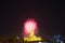 firework shown behide Buddhist Temple in Vientiane, Lao PDR.