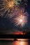 Fireworks Above Boat and River