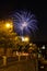 Fireworks upon beautiful historical street close to riverbank