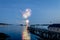 Fireworks on Boothbay Harbor, Maine, reflect off the water on July 4th