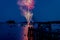 Fireworks on Boothbay Harbor, Maine, reflect off the water on July 4th