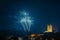 Fireworks display above Richmond Castle, North Yorkshire with houses in the foreground