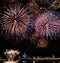 Fireworks light up the sky with dazzling display on dark background in taipei