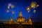 Fireworks over Buddhist Pagoda in twilight