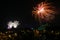 Fireworks over Cinderella\'s Castle and Space Mountain.