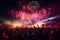 Fireworks over a festival crowd capturing the