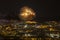 Fireworks over the night city of Brno in the Czech Republic in Europe. Above the city are different colored shapes of flares.