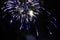 Fireworks. Salute. Sky background Amazing extravaganza of bright yellow sparkling lights in the night sky during the New Year and